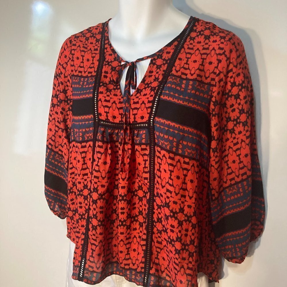 Collective  Clothing  Red & black loose baby doll top black crochet lace details